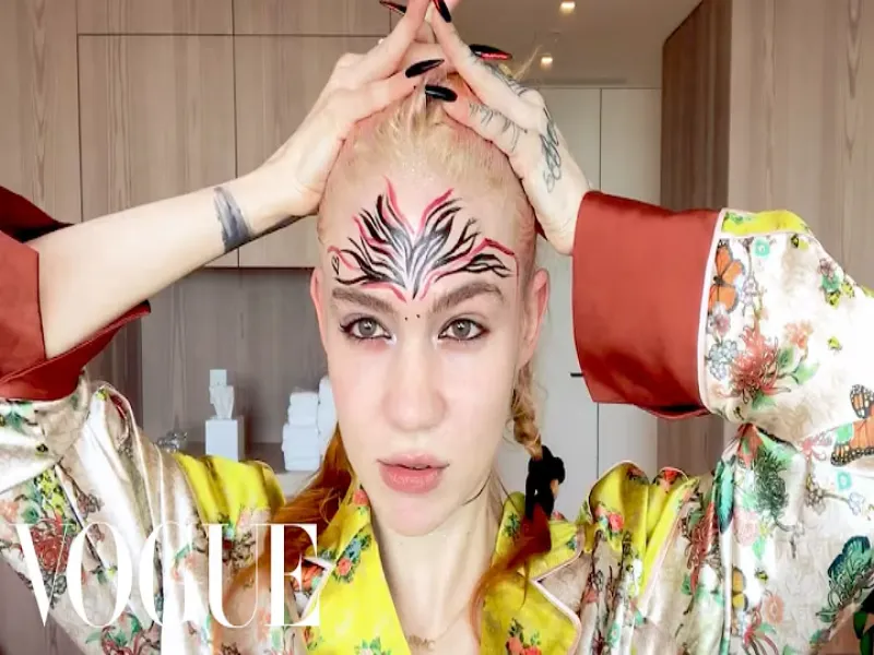 Grimes Unveils Large Face Tattoo